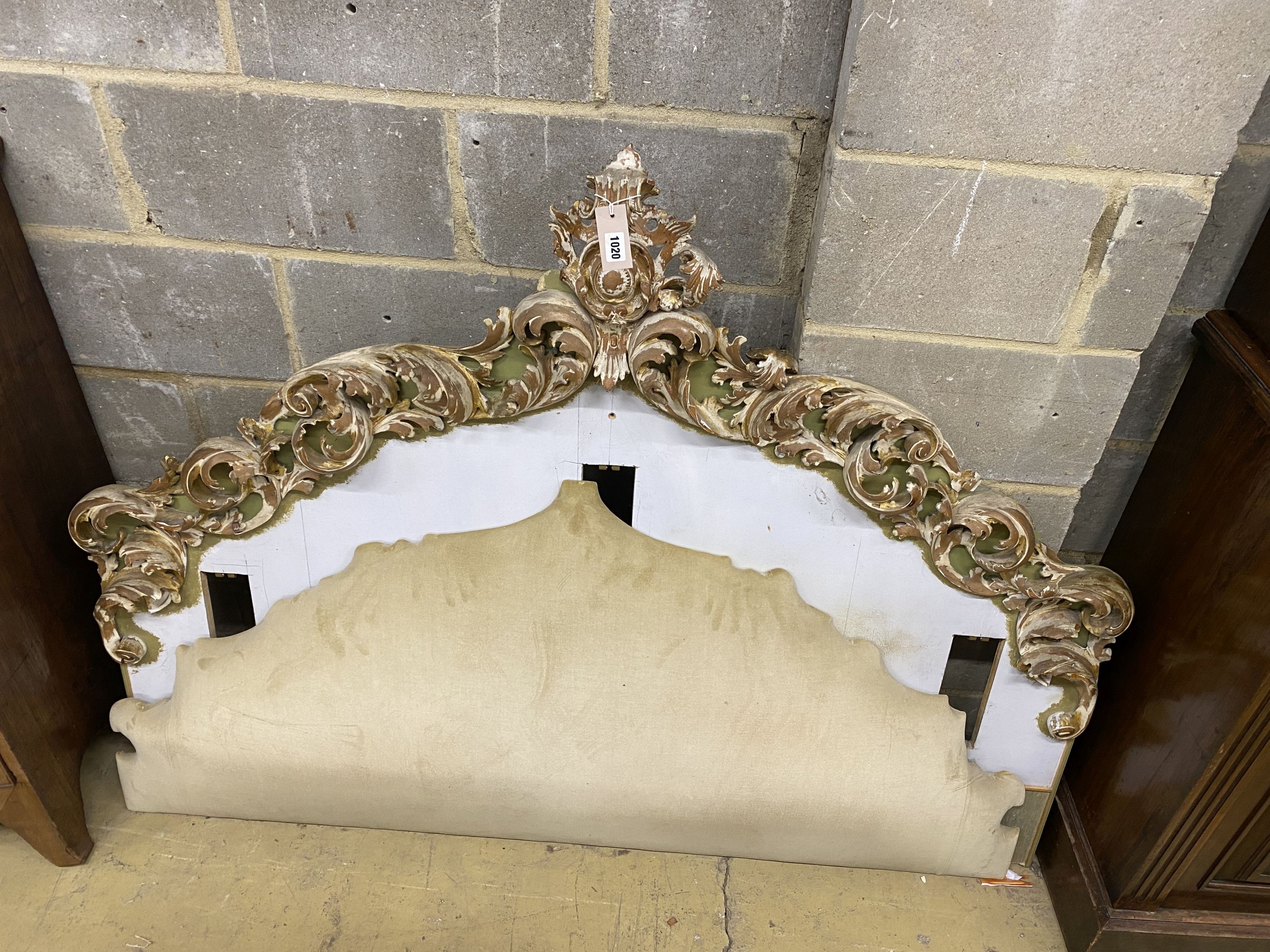 An acanthus carved and stripped bed headboard, width 150cm